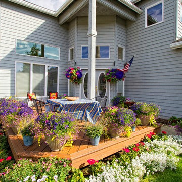Outdoor Living Spaces Created from Angled Front Deck and Back Decks