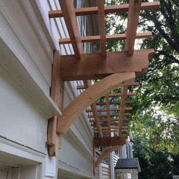 South Charlotte HardiePlank Siding and Custom Cedar Pergola