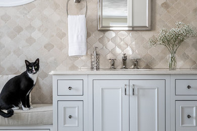 Design ideas for a transitional master bathroom in Boston with beige tile, mosaic tile, marble floors, an undermount sink, engineered quartz benchtops, grey floor, beige benchtops, beaded inset cabinets and grey cabinets.