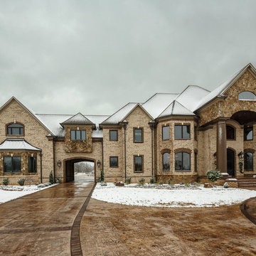 Nottingham Tudor Brick Home featuring Millstone Accents - Tennessee