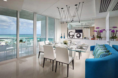 Example of a minimalist dining room design in Miami