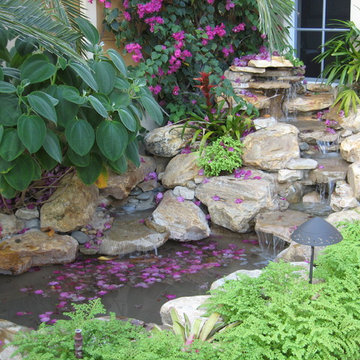 Tropical Waterfall garden pond in front entrance