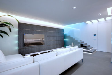 Ispirazione per un ampio soggiorno design aperto con pareti bianche, pavimento in gres porcellanato, pavimento grigio e soffitto ribassato