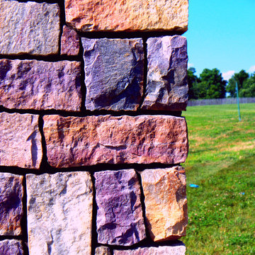 Stone columns and gate posts constructed by Quality Concrete & Masonry