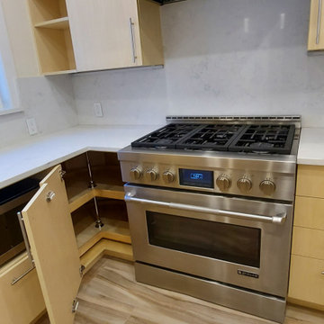 New custom kitchen cabinets with sunny Maple wood veneer  doors.