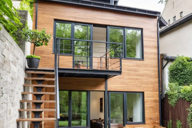 Cette image montre une façade de maison design.