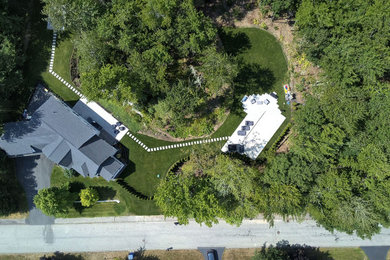 This is an example of a mid-sized contemporary backyard landscaping in Portland Maine.