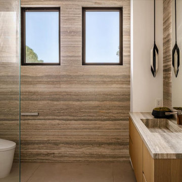 Luxury Silver Vein Cut Travertine Primary Bathroom