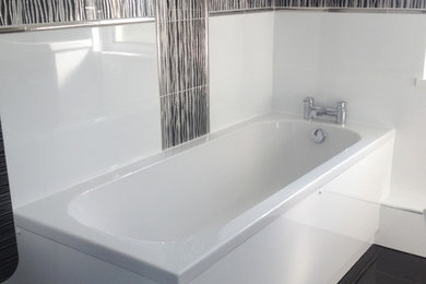 This is an example of a medium sized modern bathroom in Other.