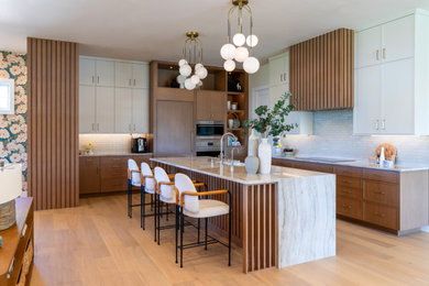 Example of a transitional kitchen design in Denver