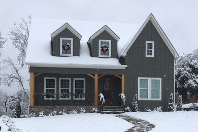 Inspiration for a craftsman green exterior home remodel in Birmingham