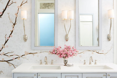 Mid-sized transitional 3/4 multicolored tile and mosaic tile bathroom photo in New York with recessed-panel cabinets, blue cabinets, an undermount sink and quartz countertops