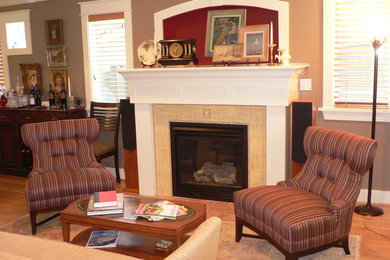 Mid-sized elegant formal and enclosed medium tone wood floor living room photo in Seattle with beige walls, a standard fireplace, a tile fireplace and no tv
