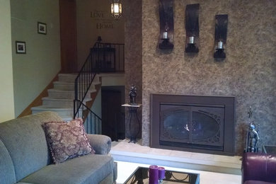 Inspiration for a mid-sized timeless formal and enclosed ceramic tile living room remodel in Columbus with a standard fireplace, a metal fireplace, beige walls and no tv