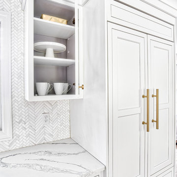 Frost Cabinets and Marble Backsplash