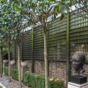 Amazing Sculpture gets Highlighted with Artificial Foliage