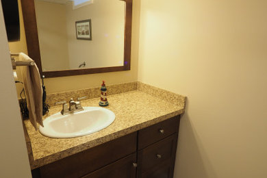 Bathroom - mid-sized contemporary 3/4 vinyl floor, gray floor and single-sink bathroom idea in Detroit with white walls, granite countertops and beige countertops