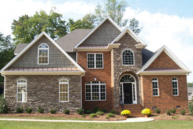 Example of an arts and crafts exterior home design in Other