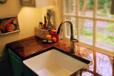 Home bar - cottage home bar idea in Other with an undermount sink and brown countertops