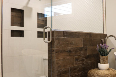 Alcove shower - large contemporary master white tile and porcelain tile porcelain tile and beige floor alcove shower idea in Other with gray walls and a hinged shower door