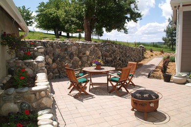Example of a farmhouse patio design in Seattle