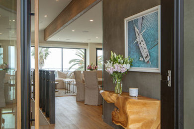 Example of a beach style home design design in San Diego