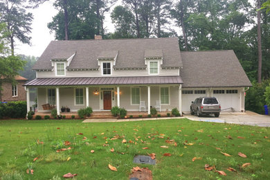 Mid-sized beach style gray two-story concrete fiberboard exterior home photo in Atlanta with a shingle roof