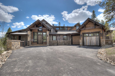 Example of a transitional exterior home design in Denver