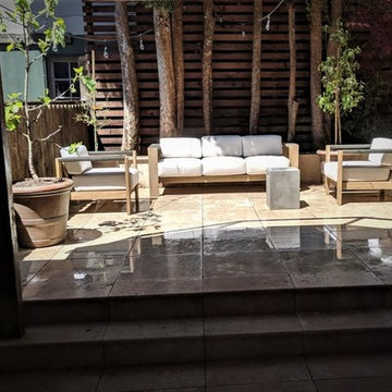 Split Level Travertine Patio and Ipe Deck with Cable Railing