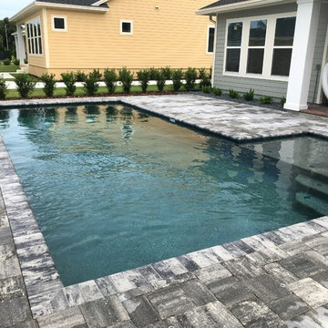 Swimming Pool with sun shelf in Oviedo, Florida