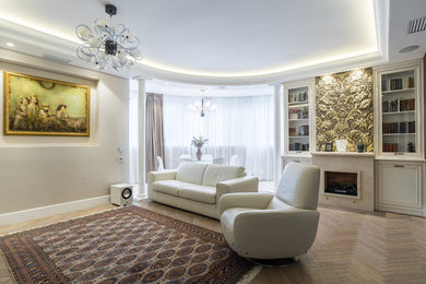 This is an example of a mid-sized transitional formal living room in Moscow with beige walls, medium hardwood floors, a stone fireplace surround and beige floor.