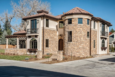 Example of a tuscan exterior home design in Denver