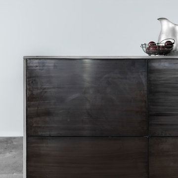 Thin concrete counter top and brass tombac fronts