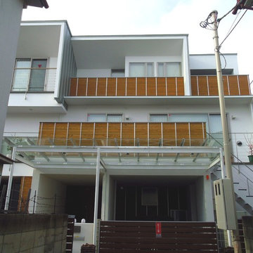 都市に開く家