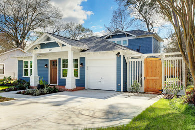 Inspiration for a craftsman two-story concrete fiberboard exterior home remodel in Houston