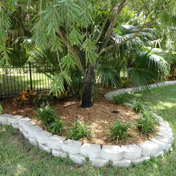 Tropical Backyard with Retaining Wall