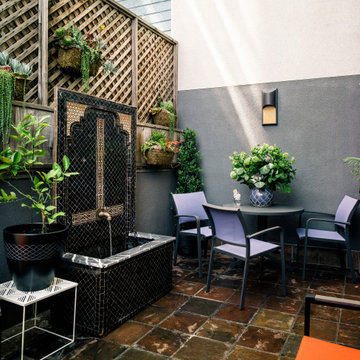 Midcentury Moroccan Loft Patio Courtyard | Kimball Starr Interior Design