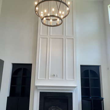 Fireplace with Wood Paneling Fireplace and Custom Built-in Cabinets in Cypress,