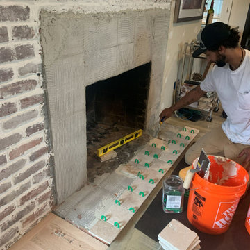 DURING: INSTALLING THE CAST-STONE MANTEL SURROUND