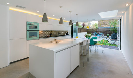 Here’s How to Fill the Space Above Your Kitchen Wall Units