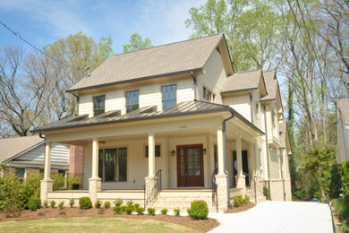 Large transitional beige two-story wood exterior home idea in Atlanta with a shingle roof
