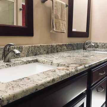 Typhoon Bordeaux Granite with Wellborn Cabinets
