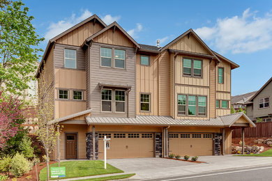 Mid-sized transitional brown three-story mixed siding exterior home idea in Portland