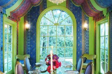 Enclosed dining room - eclectic enclosed dining room idea in Los Angeles with multicolored walls