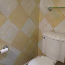 tiny room with toilet in master bath