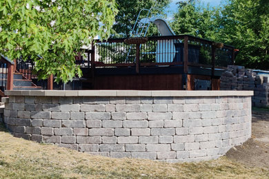 Example of a classic backyard brick patio design in Chicago