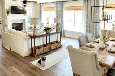Living room - coastal open concept living room idea in Other with a wall-mounted tv