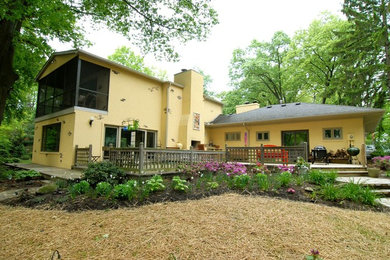 Mid-sized southwest backyard deck photo in Other with a fire pit and no cover