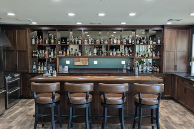 Inspiration for a home bar remodel in Other