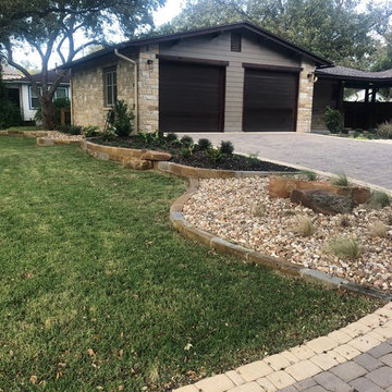 Combination of mulch and Colorado River Rocks, Moss Boulders & Sandstone borders